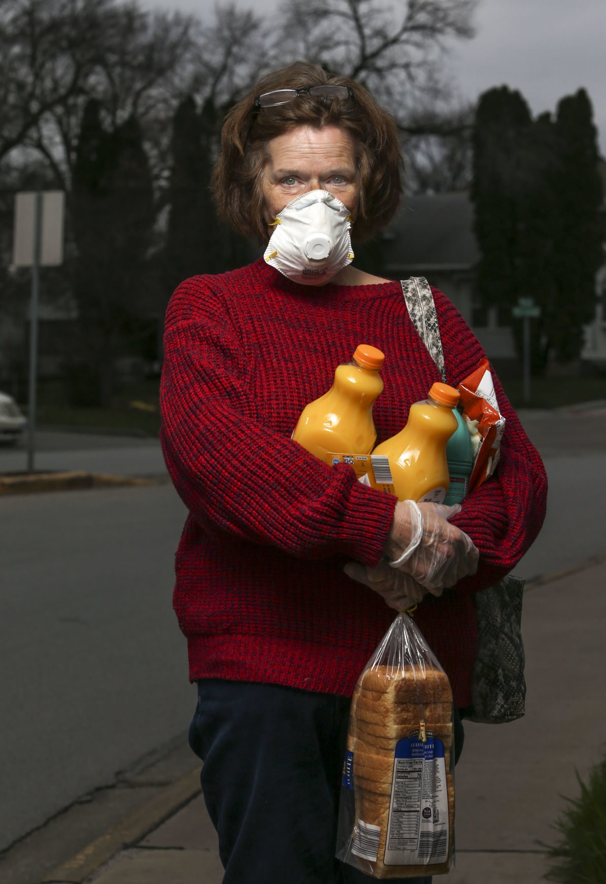 PUTTING ON A MASK, DEALING WITH COVID-19
